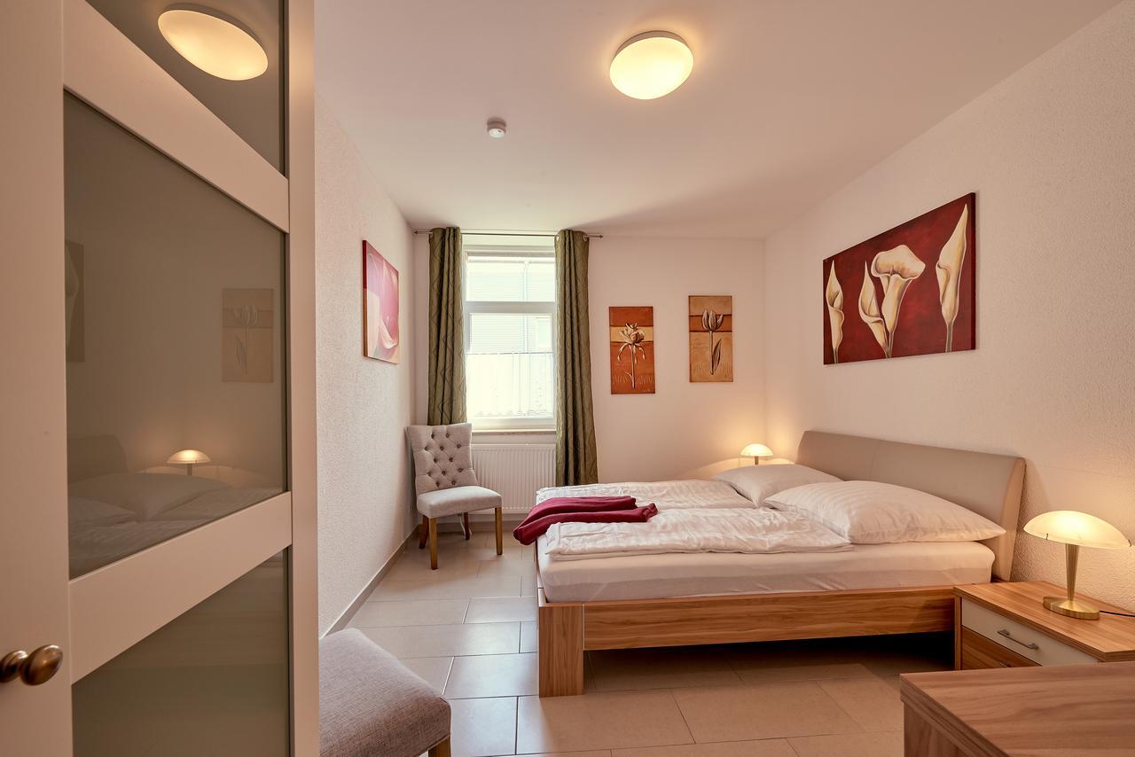 Hotel Zur Alten Stadtkellerei 라이프치히 외부 사진 A bedroom